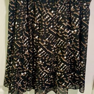 Soft sheer mini skirt (lined) ! Swish! Like new, yes really! Worn once!